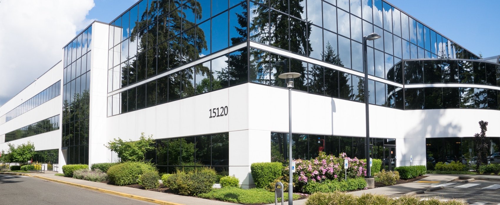 a white and glass commercial buildings