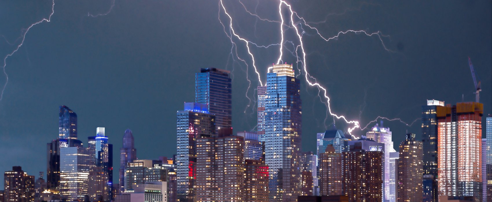 a city struck by multiple lighting strikes