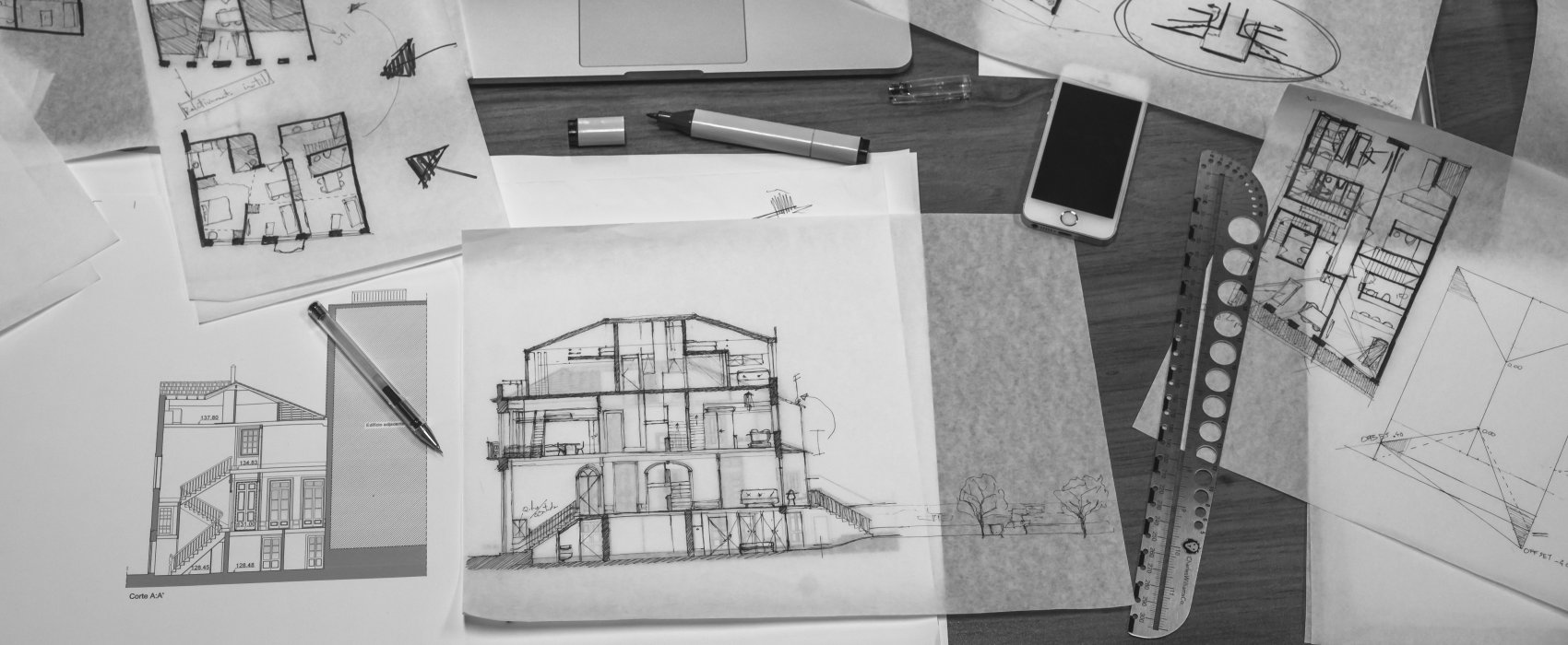 blueprints and laptop
