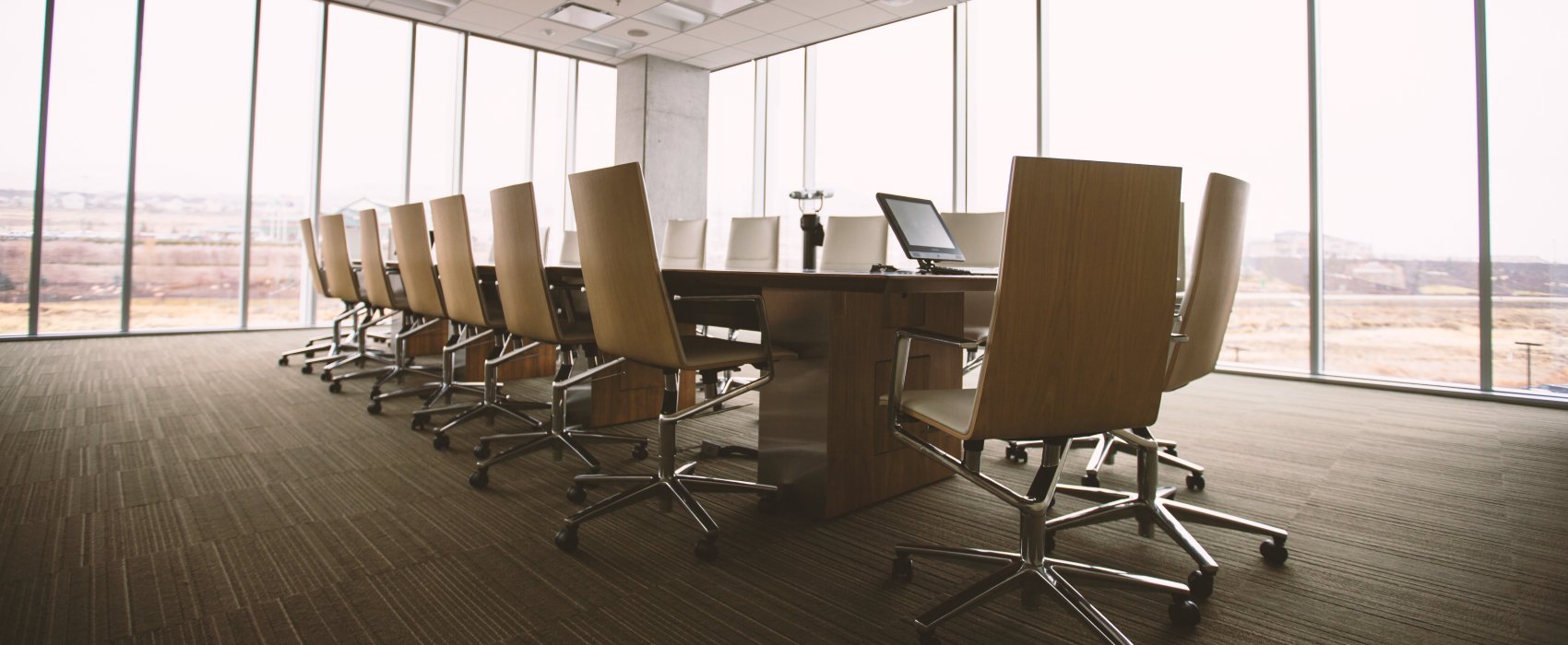 An empty board room with glass walls