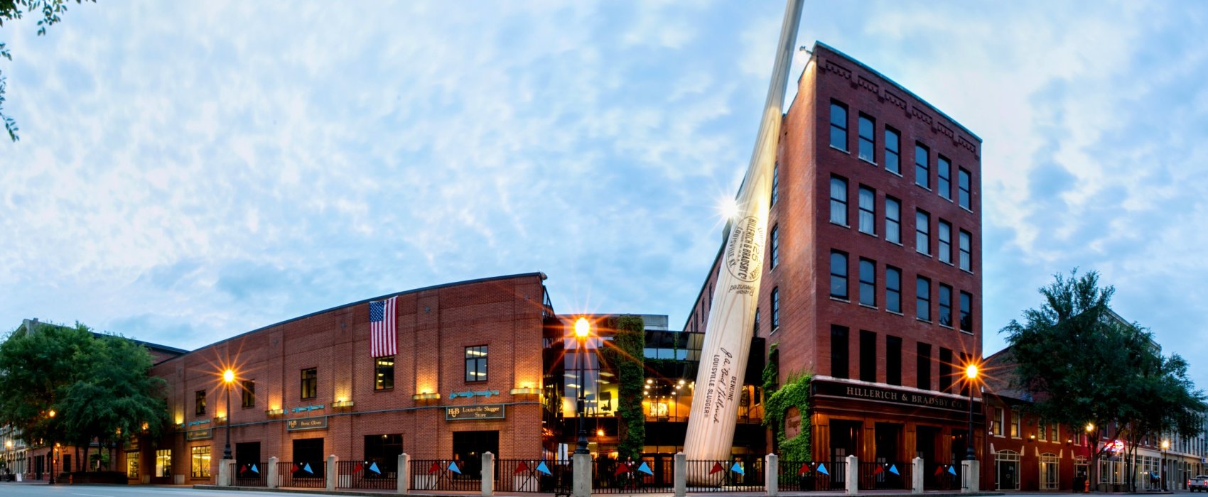 an exterior shot of the Louisville slugger factory with a jumbo bat
