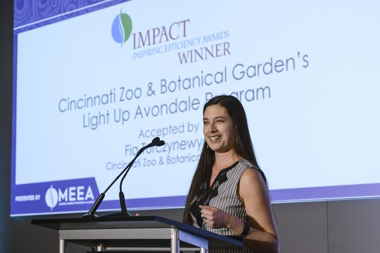 Fia Turczynewycz accepts Impact Award on behalf of the Cincinnati Zoo & Botanical Garden