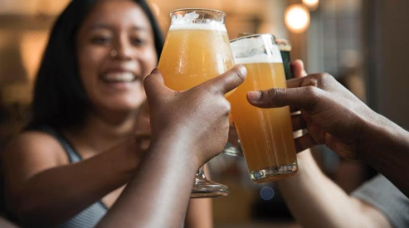 people drinking beer at a happy hour